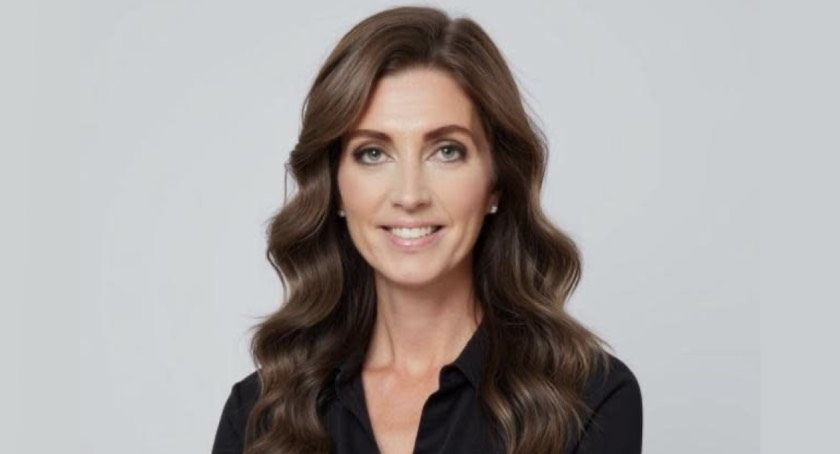 A photo of Kelly Mahoney who is smiling at the camera