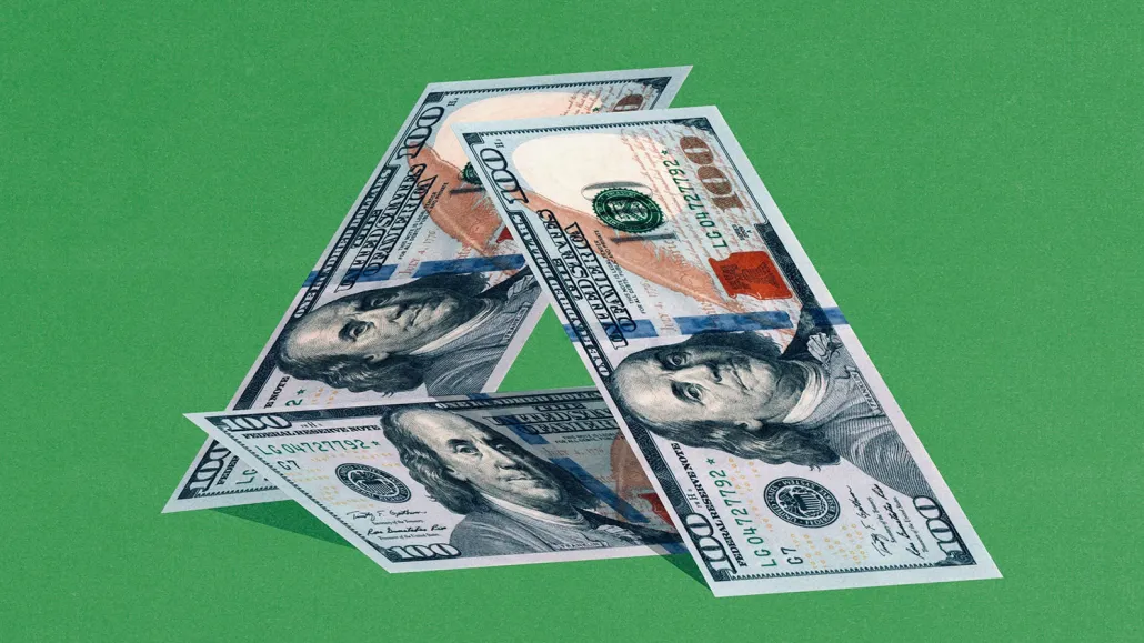 Dollars in a playing card pyramid.