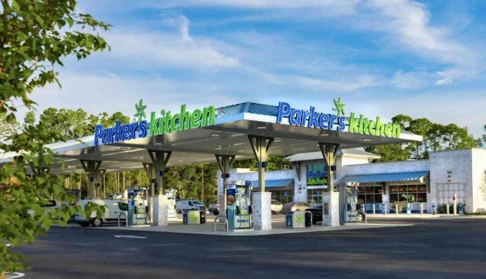 A photo of the exterior of a parkers kitchen gas station