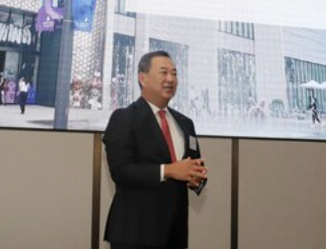 Vice Chairman and Group CEO of Lotte Retail, Samuel Sanghyun Kim, speaking at the CEO IR Day in Korea