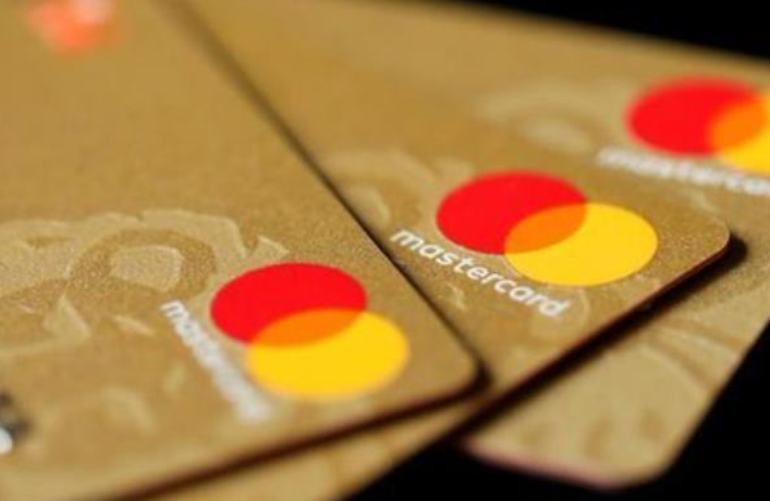 close up photo of three credit cards showing the mastercard logo