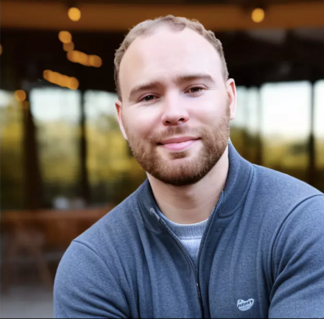 A headshot of Oliver Goodge.